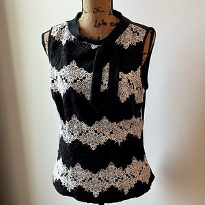 New Yord and Co black and ivory sleeveless top.